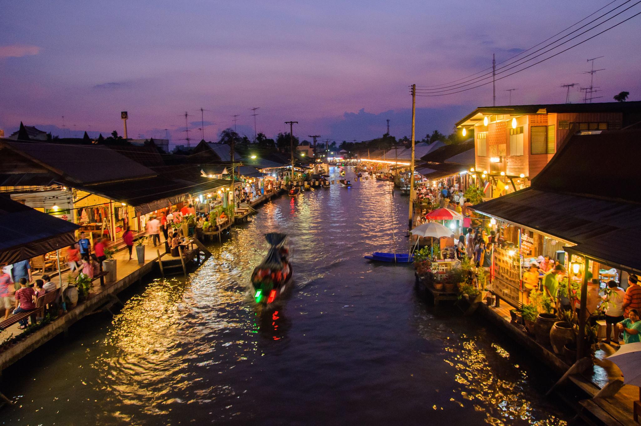 Thailand floating market vendors on boats